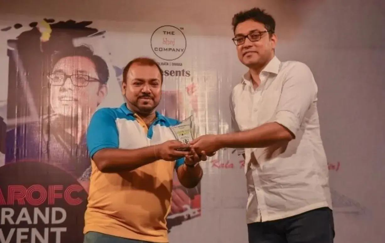 An award presentation at an industry event.